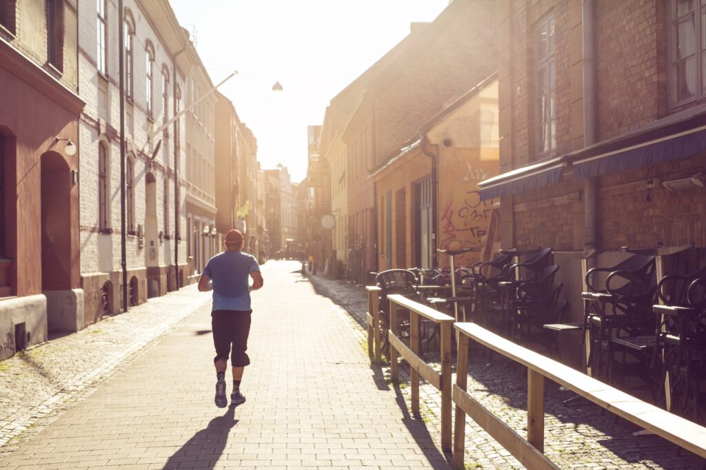 Man running in old town